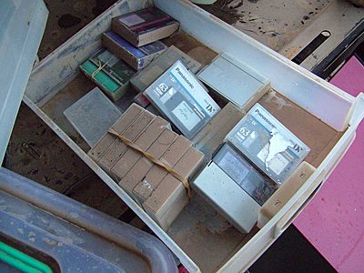 Rescuing video tape archives from the floods-muddy-tapes-1.jpg