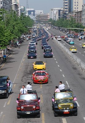 Parade of cars at Chinese Wedding-video-crew2.bmp